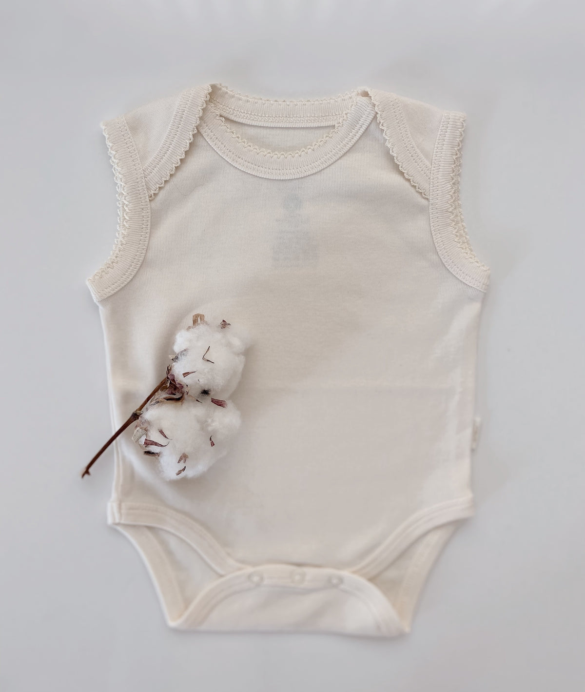Naturaborn GOTS Organik Sertifikalı Kroşetalı Kolsuz Bebek Body